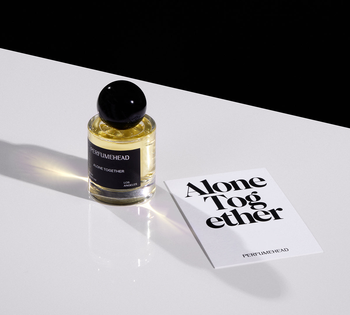 Alone Together extrait de parfum 50ml signature spray bottle and typography