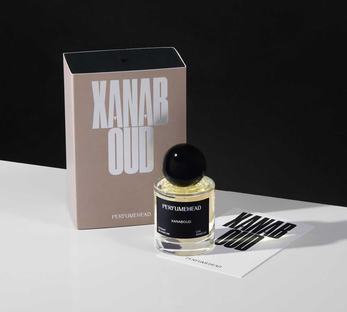 Xanaboud 50 ml extrait de parfum signature spray bottle, packaging and typography.