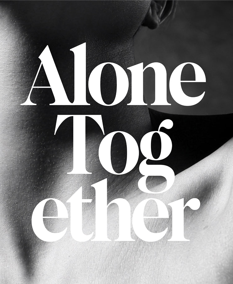 Black and white graphic print featuring a close-up of a person's neck and shoulder with the words 'Alone Together' in large white serif lettering.