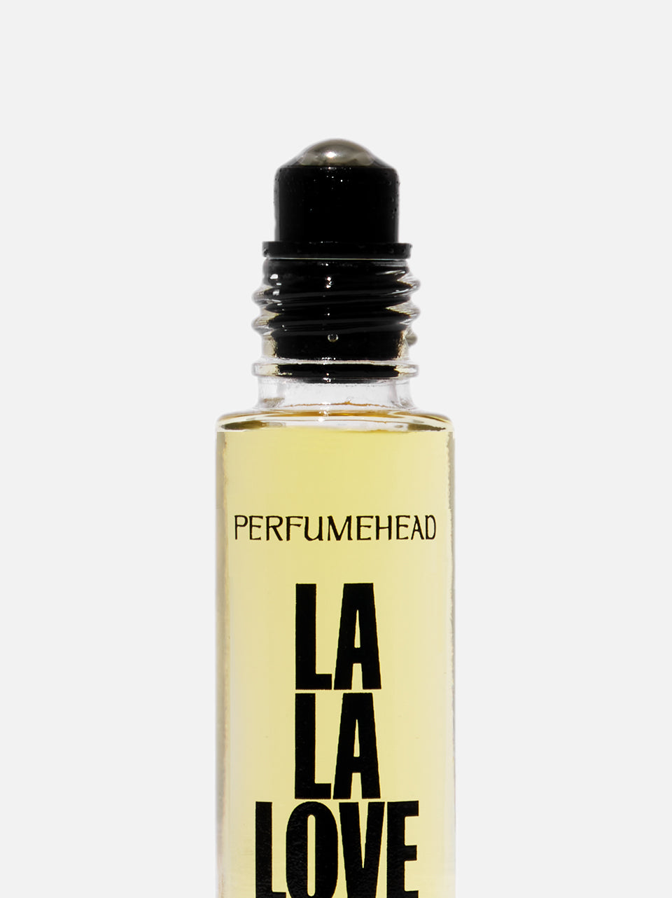 A clear glass rollerball perfume bottle filled with pale yellow liquid, featuring a black cap and bold black text reading 'PERFUMEHEAD LA LA LOVE' on the front, set against a white background.
