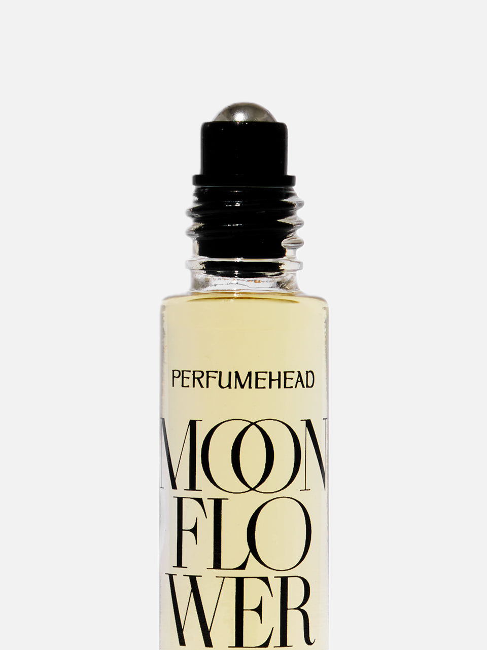 A clear glass rollerball perfume bottle filled with pale yellow liquid, featuring a black cap and a white label with the text 'PERFUMEHEAD' and 'MOON FLOWER' in large black letters, set against a white background.