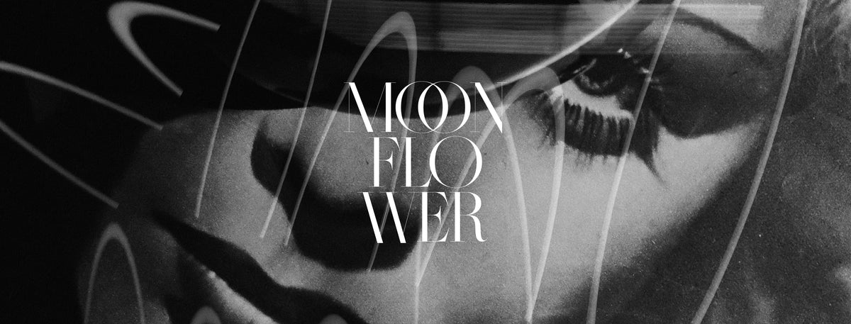 Black and white graphic design featuring a close-up of a woman's face with dramatic eye makeup, overlaid with white curved lines and the text 'MOON FLOWER' in a serif font.